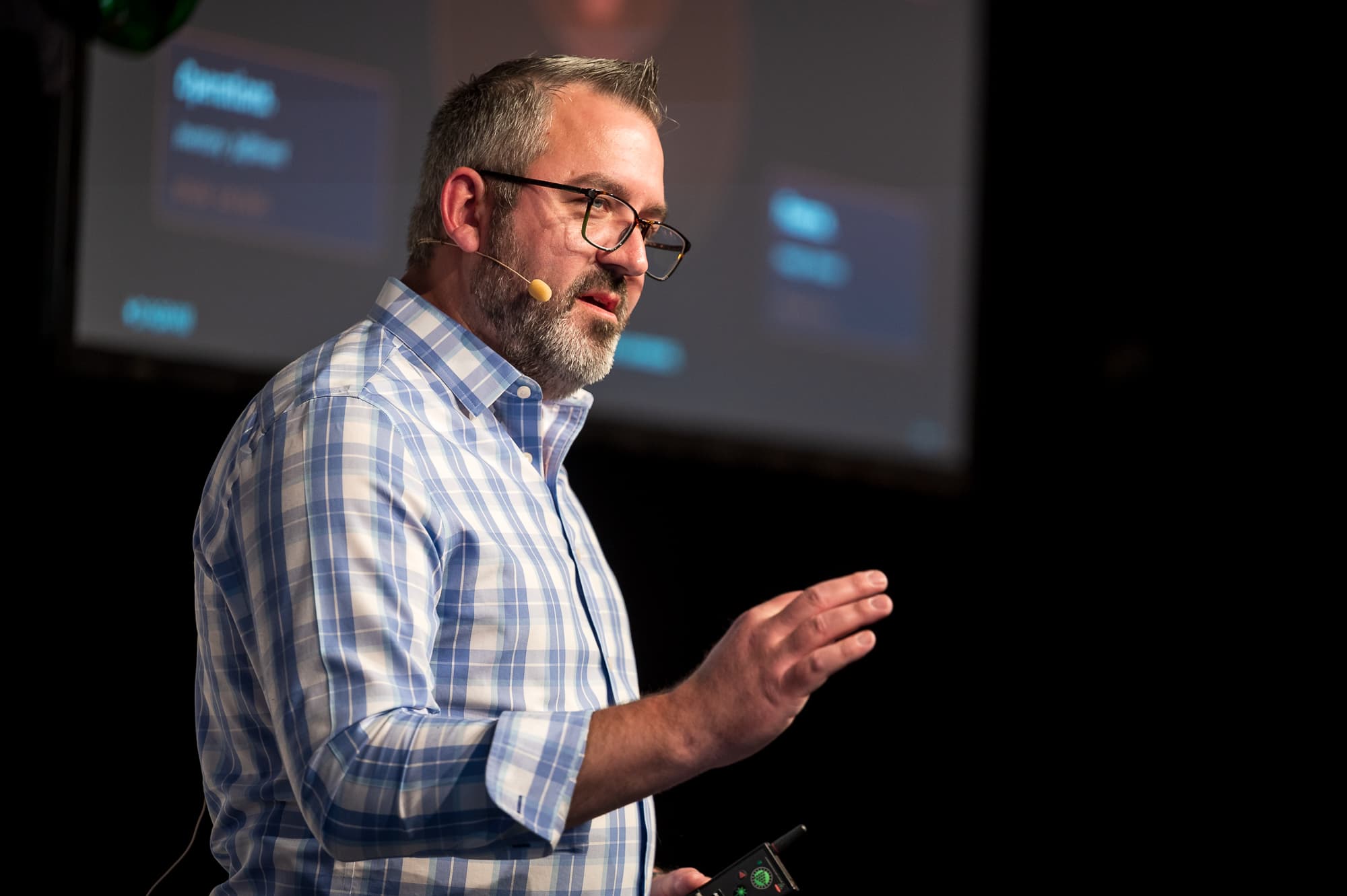 Chris Osterhout speaking on stage